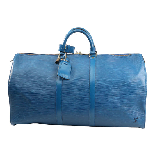 Louis Vuitton Keepall 55 Travel Bag M42955 in blue Epi leather with rolled handles, gold-tone hardware, leather name tag, and structured duffle design on a white background.