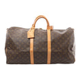 Louis Vuitton Keepall 55 duffle in brown Monogram canvas with tan leather trim, top handles, luggage tag, and zip closure, front view on white background.