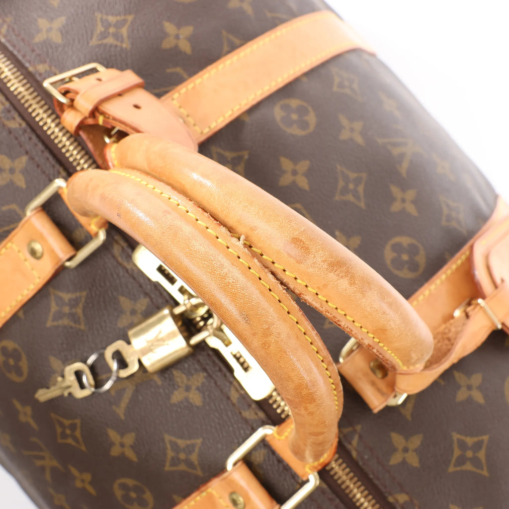 Louis Vuitton Keepall 55 Monogram Canvas Travel Bag in Brown M41424