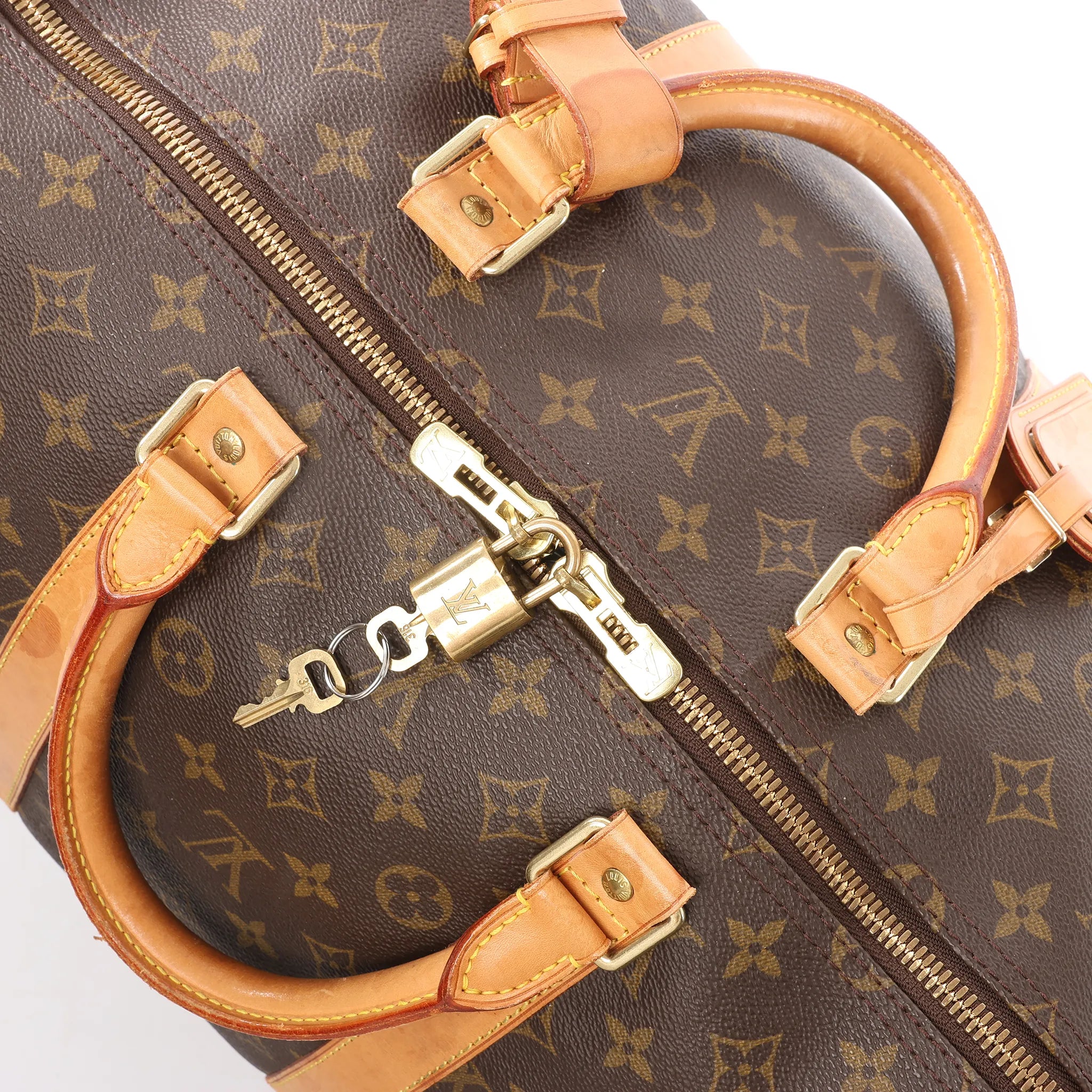 Louis Vuitton Keepall 55 Monogram Canvas Travel Bag in Brown M41424