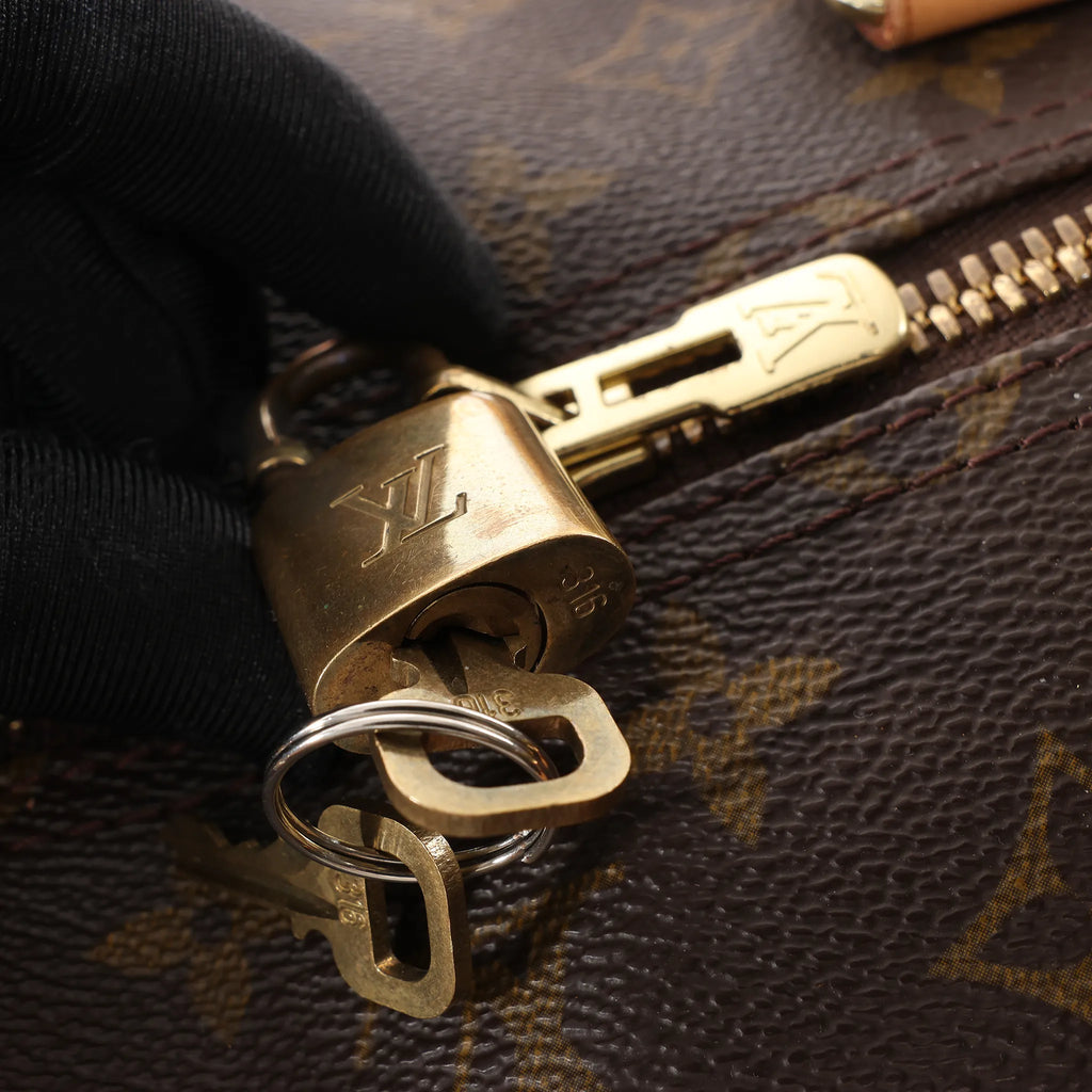 Louis Vuitton Keepall 55 Monogram Canvas Travel Bag in Brown M41424