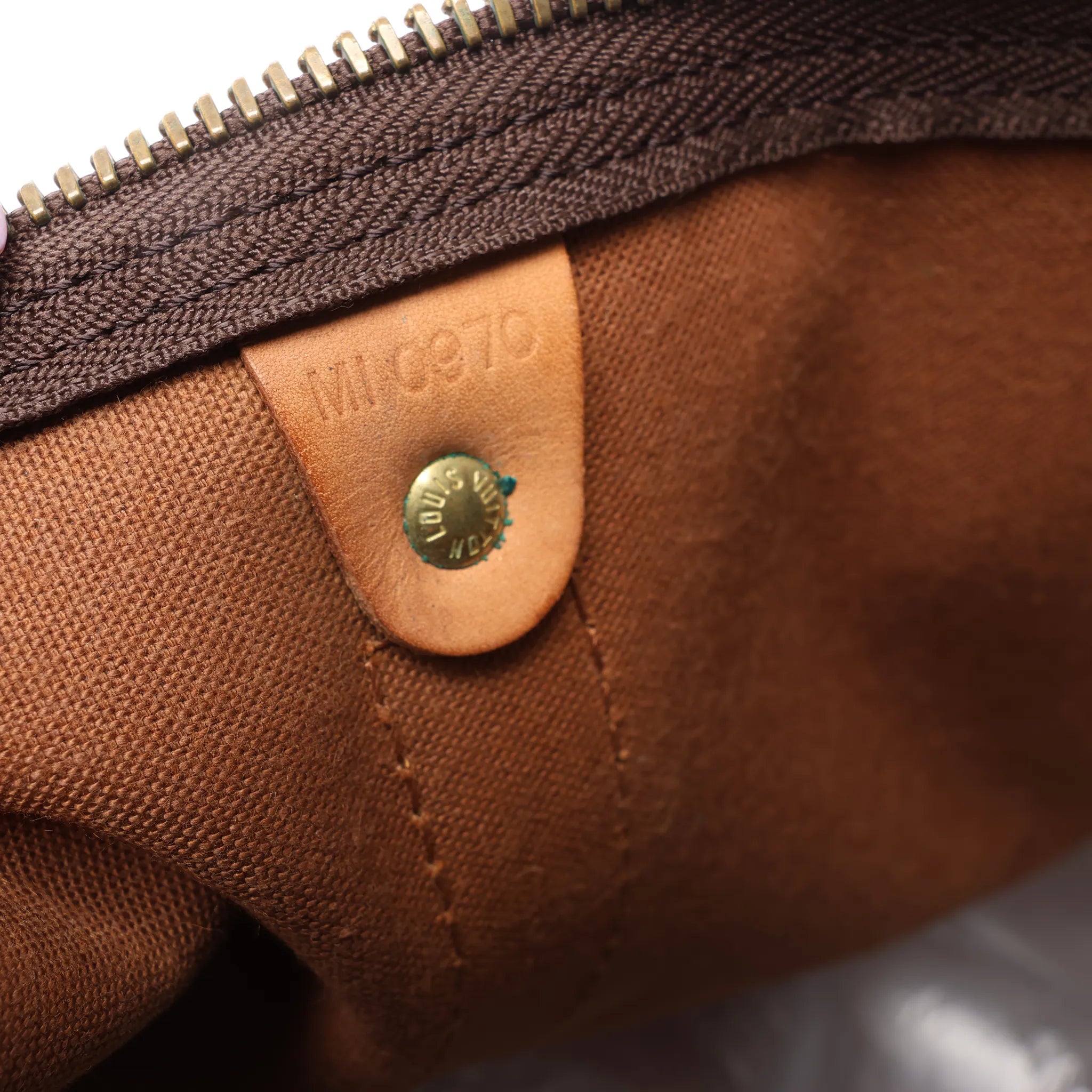 Louis Vuitton Keepall 55 Monogram Canvas Travel Bag in Brown