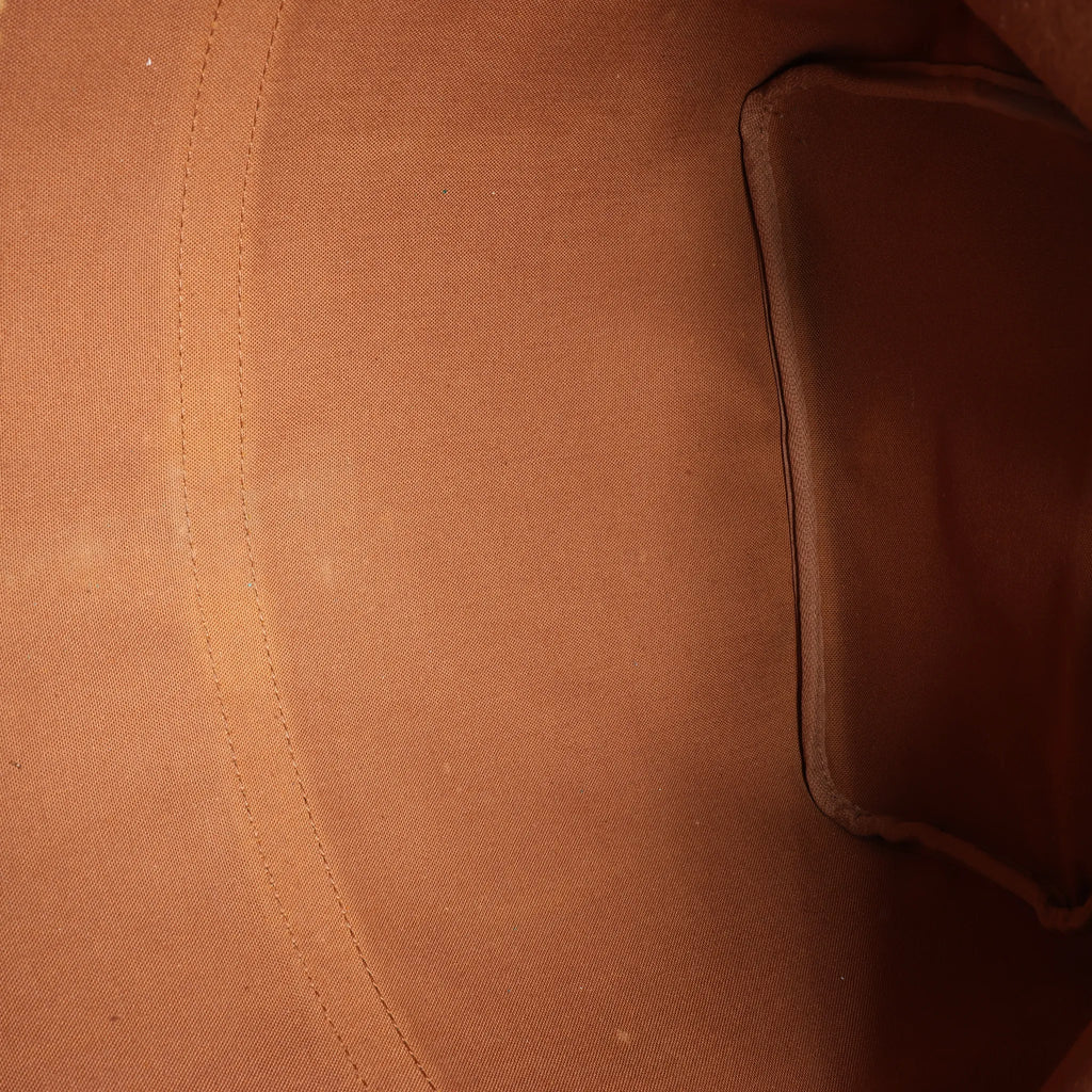 Louis Vuitton Keepall 55 Monogram Canvas Travel Bag in Brown
