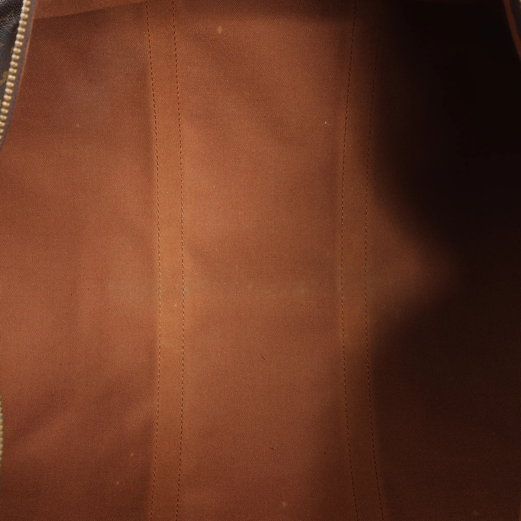 Louis Vuitton Keepall 55 Monogram Canvas Travel Bag in Brown
