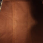 Louis Vuitton Keepall 55 Monogram Canvas Travel Bag in Brown