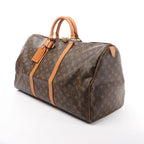 Louis Vuitton Keepall 55 Monogram Canvas Travel Bag in Brown