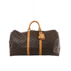 Brown Louis Vuitton Keepall 55 Monogram canvas travel bag with tan leather top handles, vertical trim, luggage tag and gold-tone zip hardware.