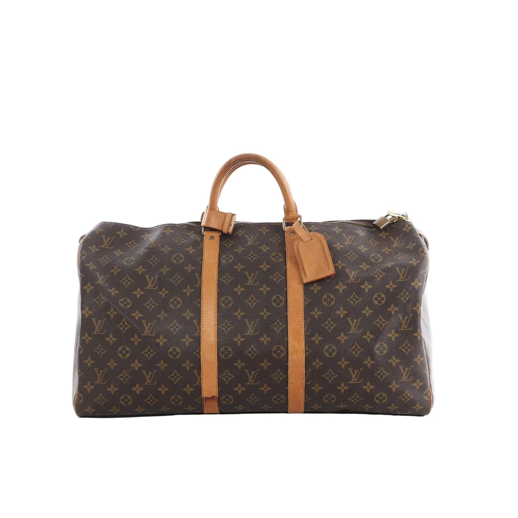 Louis Vuitton Keepall 55 travel bag in brown Monogram canvas with tan leather top handles, two vertical leather straps, zip top and hanging luggage tag.