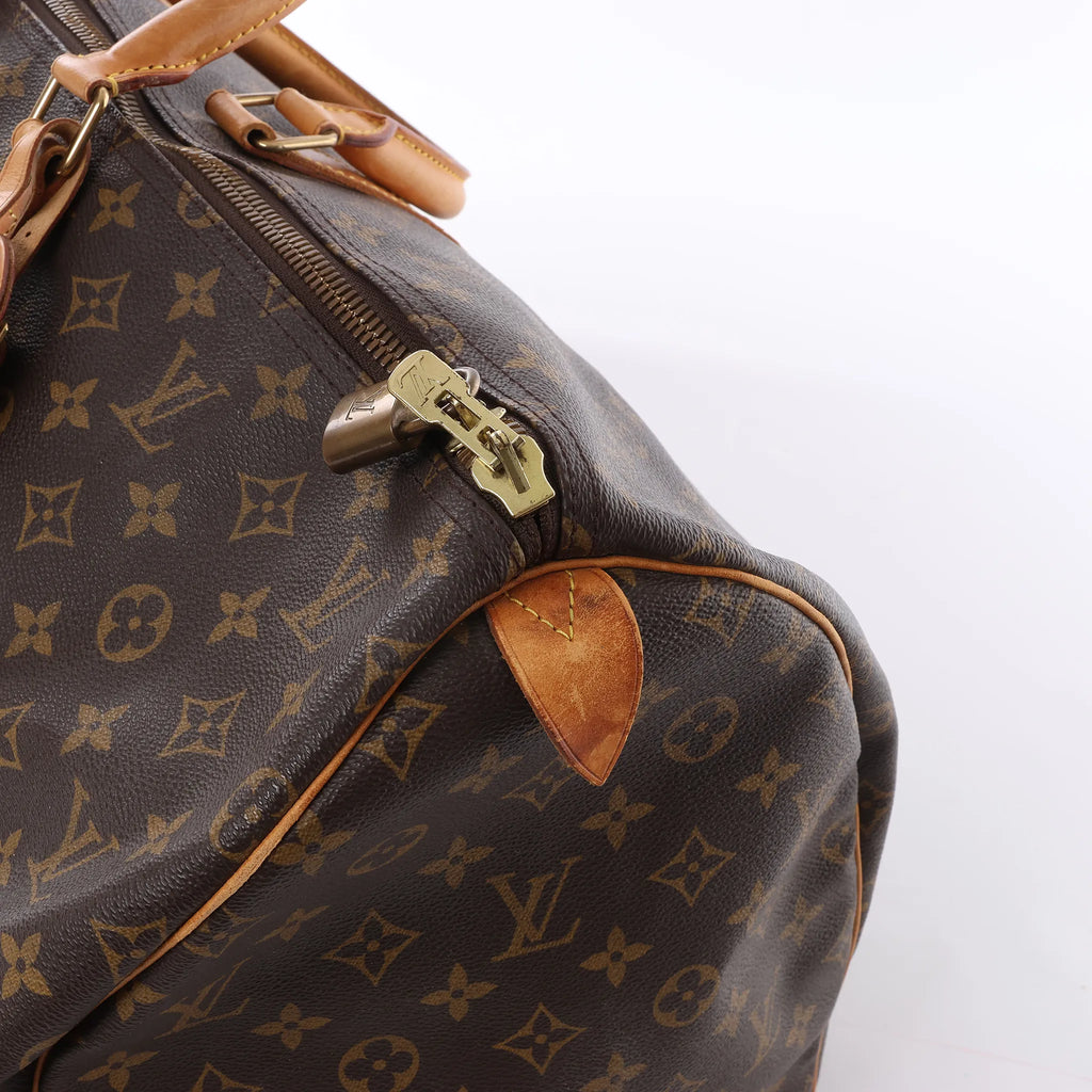 Louis Vuitton Keepall 55 Monogram Canvas Travel Bag in Brown M41424