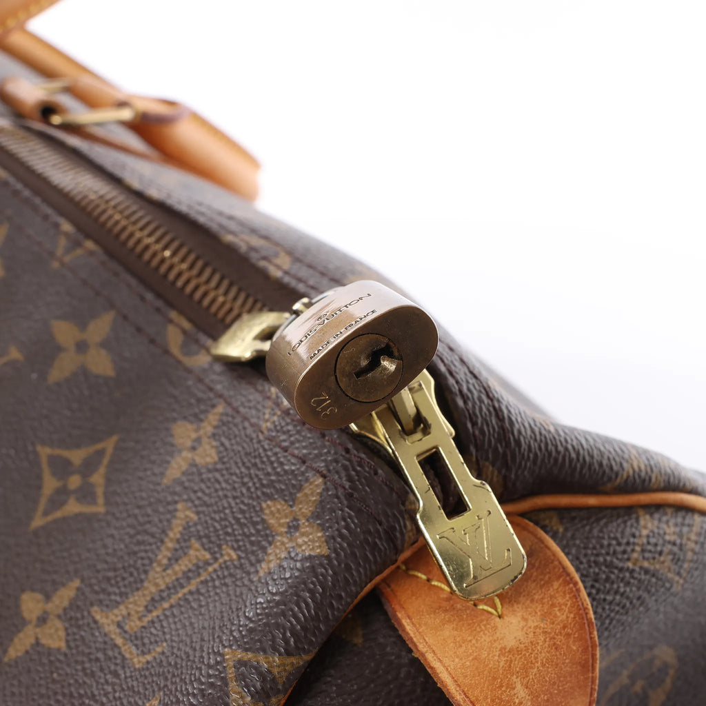 Louis Vuitton Keepall 55 Monogram Canvas Travel Bag in Brown M41424