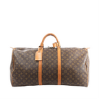 Louis Vuitton Keepall 60 travel bag in brown Monogram canvas with tan leather top handles, leather trim straps, and zip-top closure.