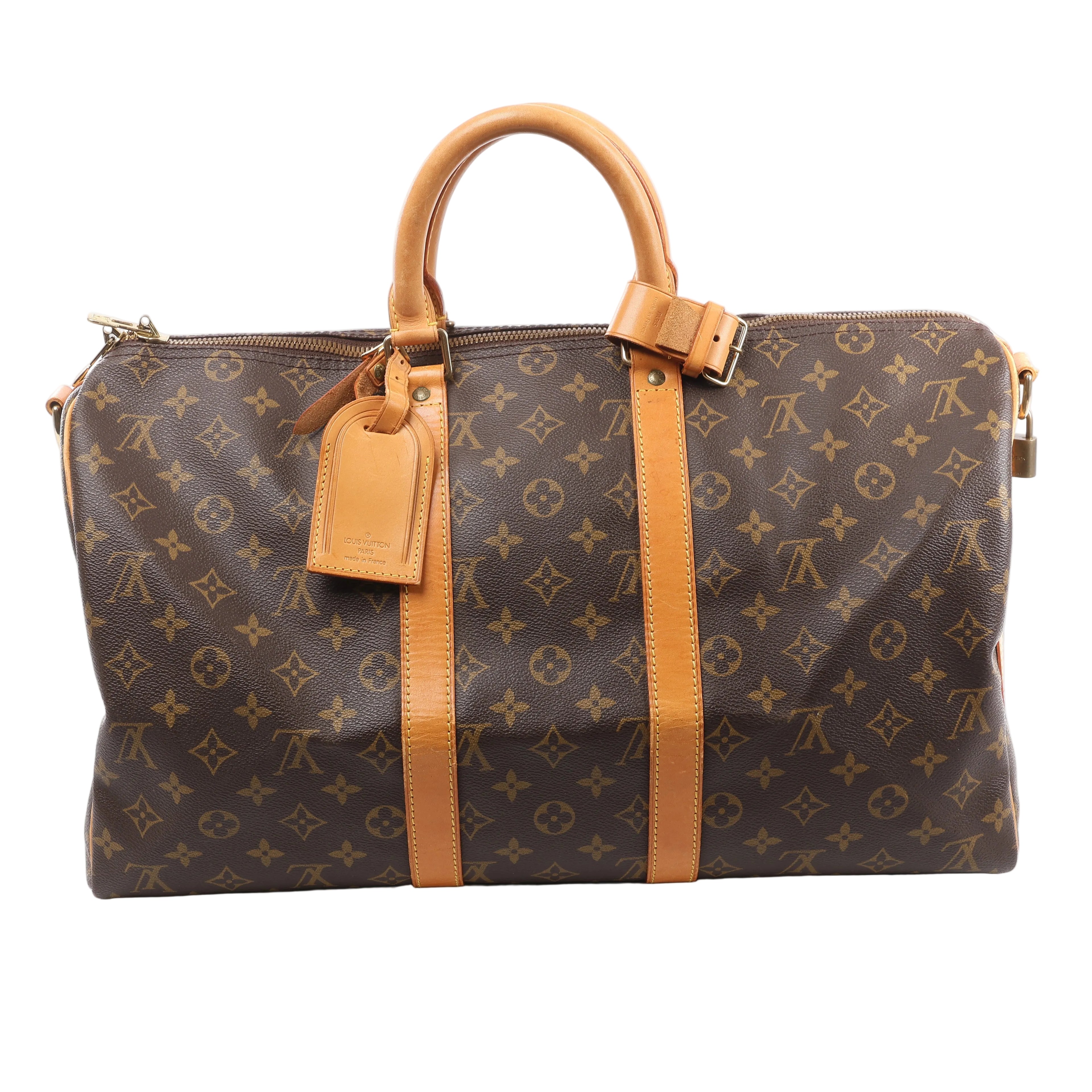 Louis Vuitton Keepall Bandoulière 45 Monogram canvas travel bag with tan leather top handles, vertical trim, luggage tag and gold-tone zip hardware.
