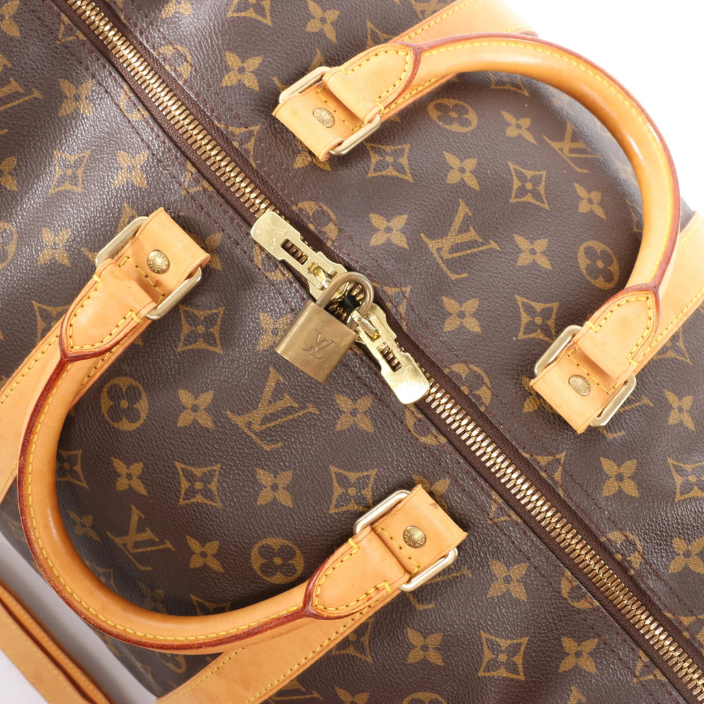 Louis Vuitton Keepall Bandoulière 55 Monogram Canvas Travel Bag in Brown M41414