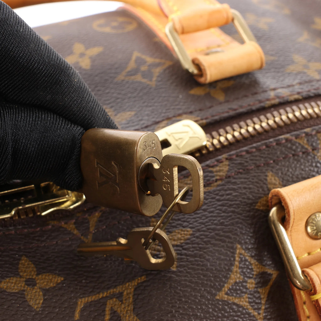 Louis Vuitton Keepall Bandoulière 55 Monogram Canvas Travel Bag in Brown M41414