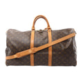 Louis Vuitton Keepall Bandoulière 55 brown Monogram canvas travel duffle with vachetta leather top handles, two vachetta leather bands, detachable shoulder strap, and top zip closure, shown on a white background.
