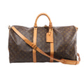 Louis Vuitton Keepall Bandoulière 55 Monogram canvas travel bag with tan leather handles and trim, shoulder strap, luggage tag and gold-tone zip hardware.