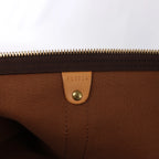 Louis Vuitton Keepall Bandoulière 60 Monogram Canvas Travel Bag in Brown M41412