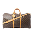 Louis Vuitton Monogram canvas Keepall Bandoulière 60 duffle bag with tan leather handles, luggage tag, and shoulder strap on white background