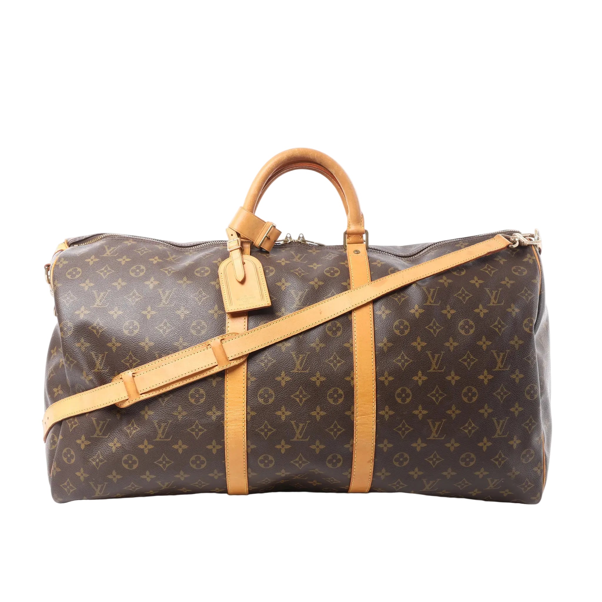 Louis Vuitton Monogram canvas Keepall Bandoulière 60 duffle bag with tan leather handles, luggage tag, and shoulder strap on white background