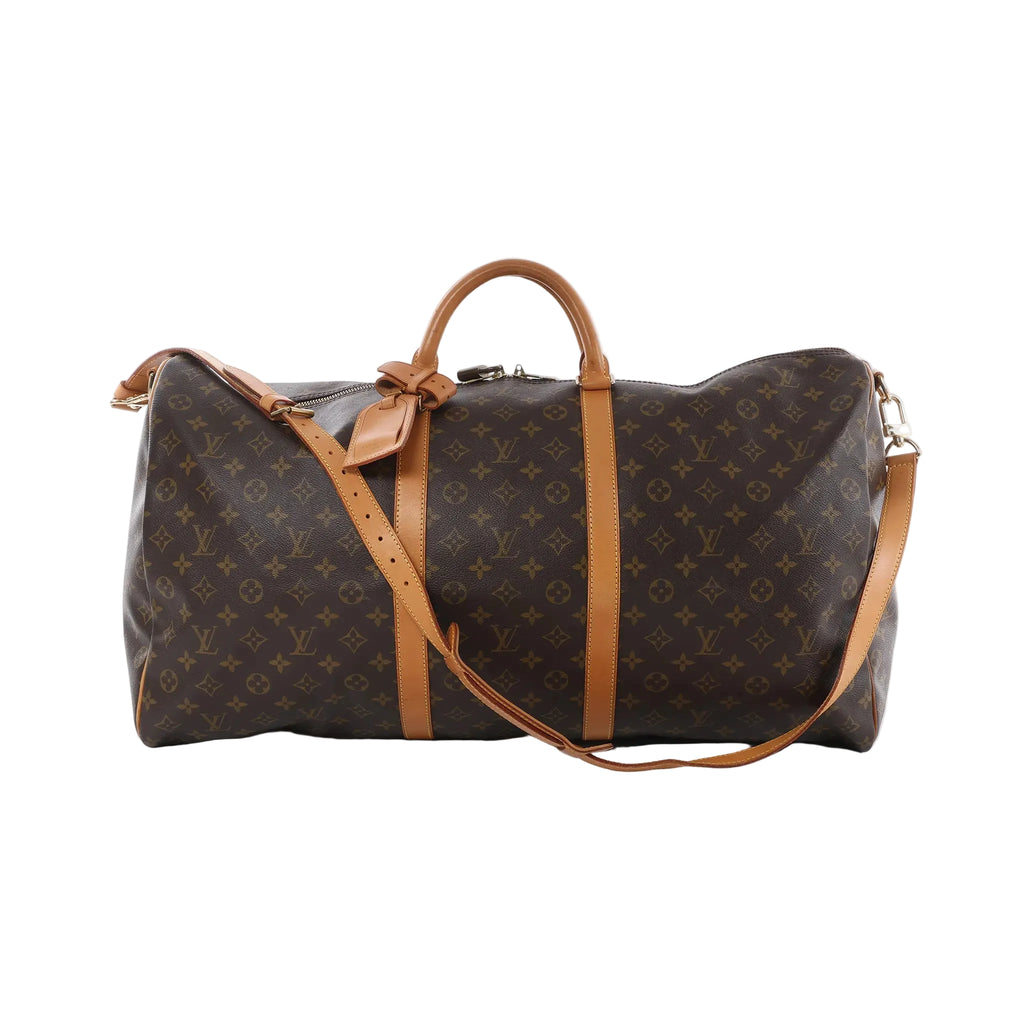 Louis Vuitton Keepall Bandoulière 60 monogram canvas travel bag in brown with tan vachetta leather trim, top handles, zip closure, luggage tag, and detachable shoulder strap.