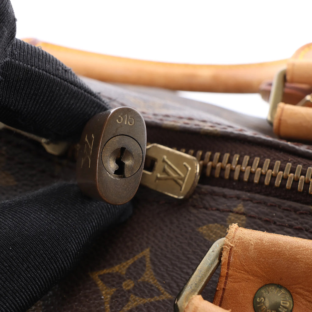 Louis Vuitton Keepall Bandoulière 60 Monogram Canvas Travel Bag in Brown M41412