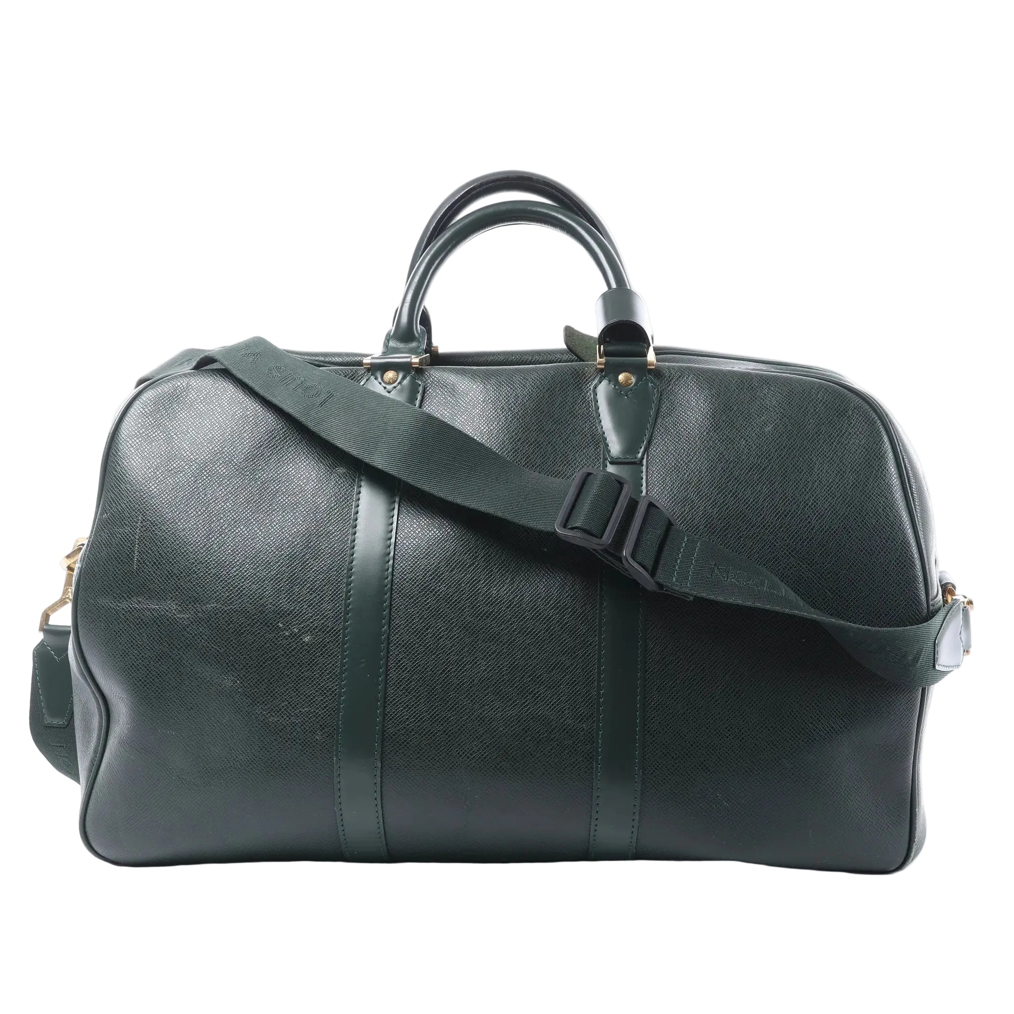 Louis Vuitton Kendall PM travel bag in dark green textured leather with rolled top handles, a wide detachable shoulder strap and gold-tone hardware.