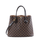 Louis Vuitton Kensington handbag in brown Damier Ebene canvas with dark brown leather handles, shoulder strap and gold-tone V hardware on a white background.