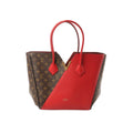 Louis Vuitton Kimono MM shoulder bag in brown Monogram canvas with red leather panels, gold-tone V detail, and red leather shoulder straps on white background.