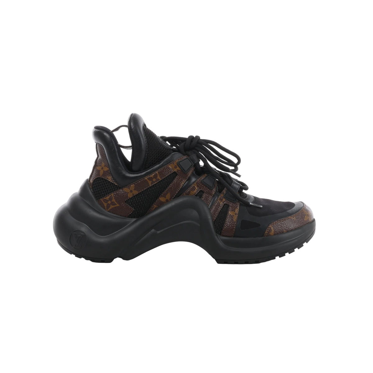 Side view of a Louis Vuitton LV Archlight sneaker with black mesh, brown Monogram panels, black laces and an oversized curved black sole.