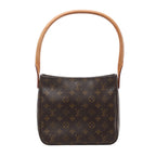 Brown Louis Vuitton Looping MM Monogram canvas shoulder bag with a curved tan leather handle and softly structured body.