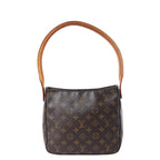 Louis Vuitton Looping MM brown Monogram shoulder bag with curved tan leather strap and zip-top closure.