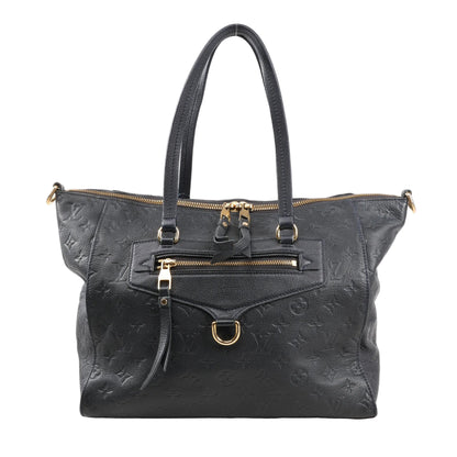 Louis Vuitton Lumineuse PM shoulder bag in navy blue Monogram Empreinte leather featuring gold-tone hardware, dual top handles, and front zip pocket.