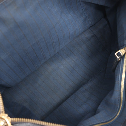 Louis Vuitton Monogram Empreinte Lumineuse PM Shoulder Bag in Navy Blue M93410