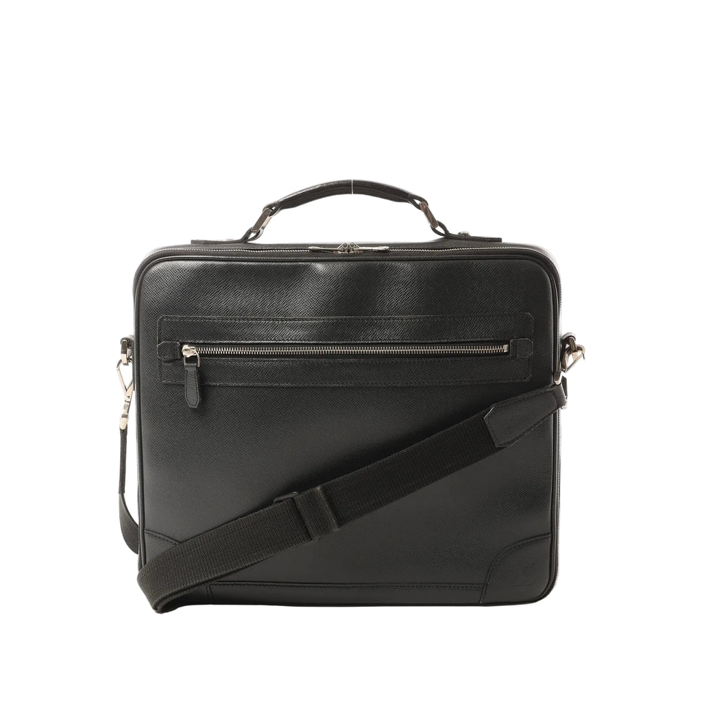 Louis Vuitton Odessa Taiga leather 2-way briefcase in ardoise black with top handle, detachable shoulder strap, and front zip pocket on white background.