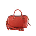 Louis Vuitton Speedy Bandoulière 25 red Monogram Empreinte leather handbag with top handles, detachable shoulder strap, zip closure, and gold-tone hardware on white background.