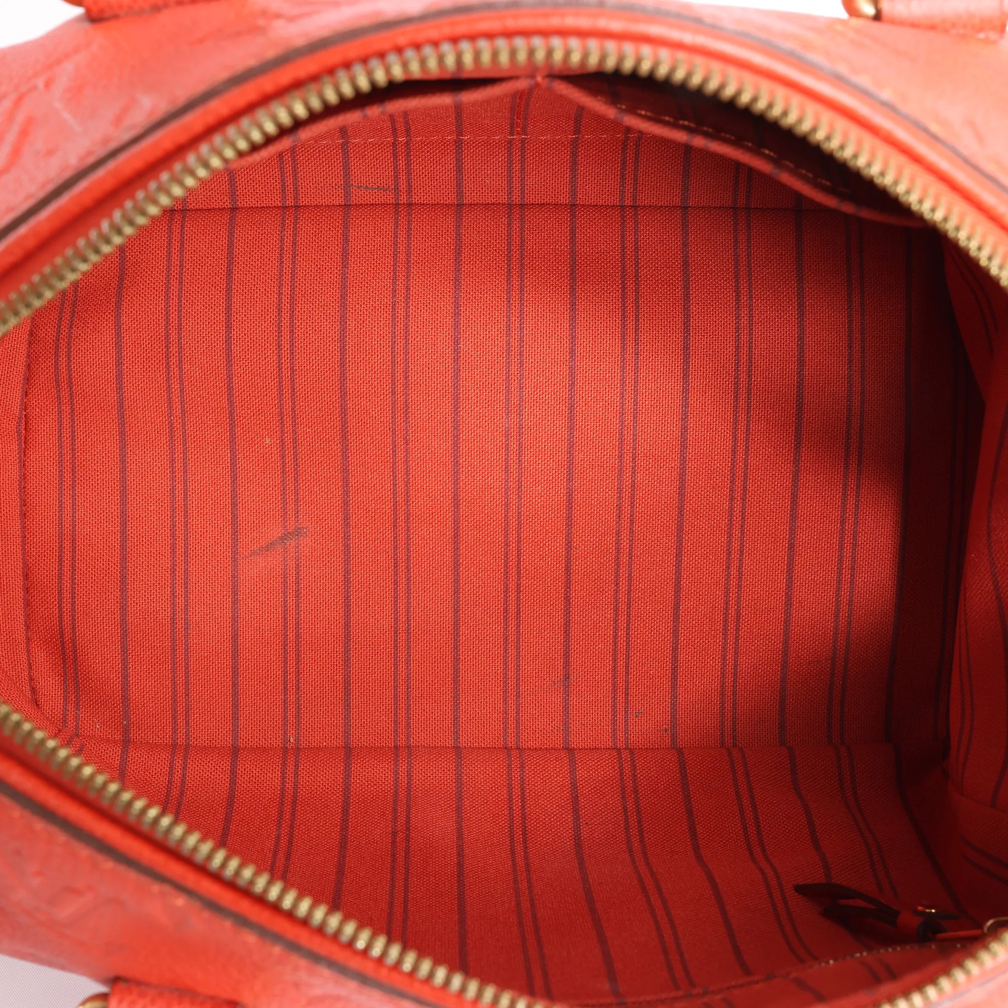 Louis Vuitton Speedy Bandoulière 25 Monogram Empreinte Handbag in Red M40758