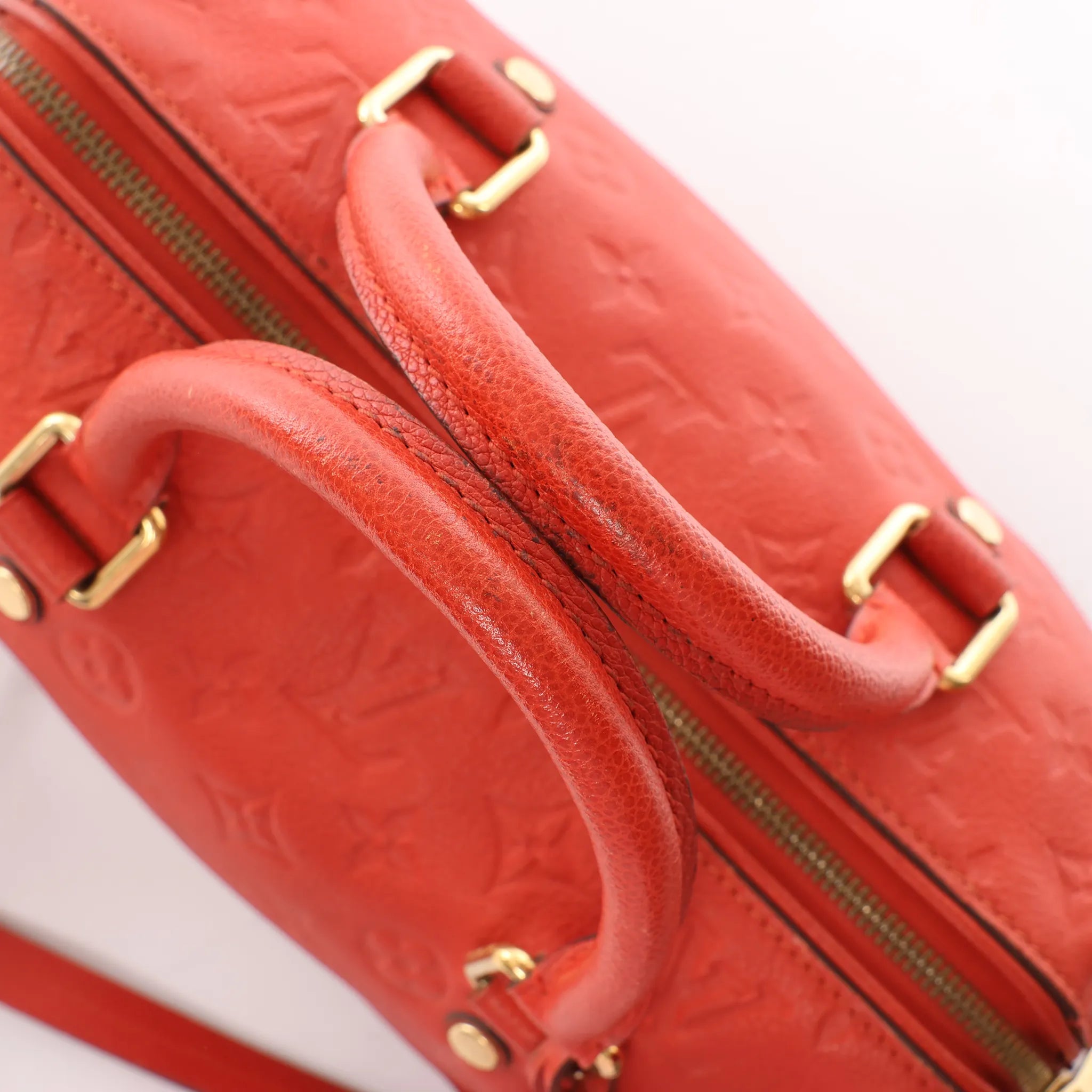 Louis Vuitton Speedy Bandoulière 25 Monogram Empreinte Handbag in Red M40758