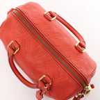 Louis Vuitton Speedy Bandoulière 25 Monogram Empreinte Handbag in Red M40758