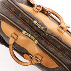 Louis Vuitton Alize Monogram Canvas 2 Poches Travel Bag in Brown M41399