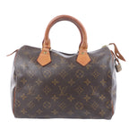 Louis Vuitton Speedy 25 M41528 brown Monogram handbag with tan leather top handles, gold-tone hardware and padlock on white background.