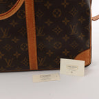 Louis Vuitton Porte Documents Voyage Monogram Canvas Handbag in Brown M53361