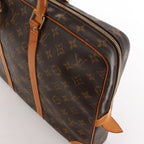 Louis Vuitton Porte Documents Voyage Monogram Canvas Handbag in Brown M53361