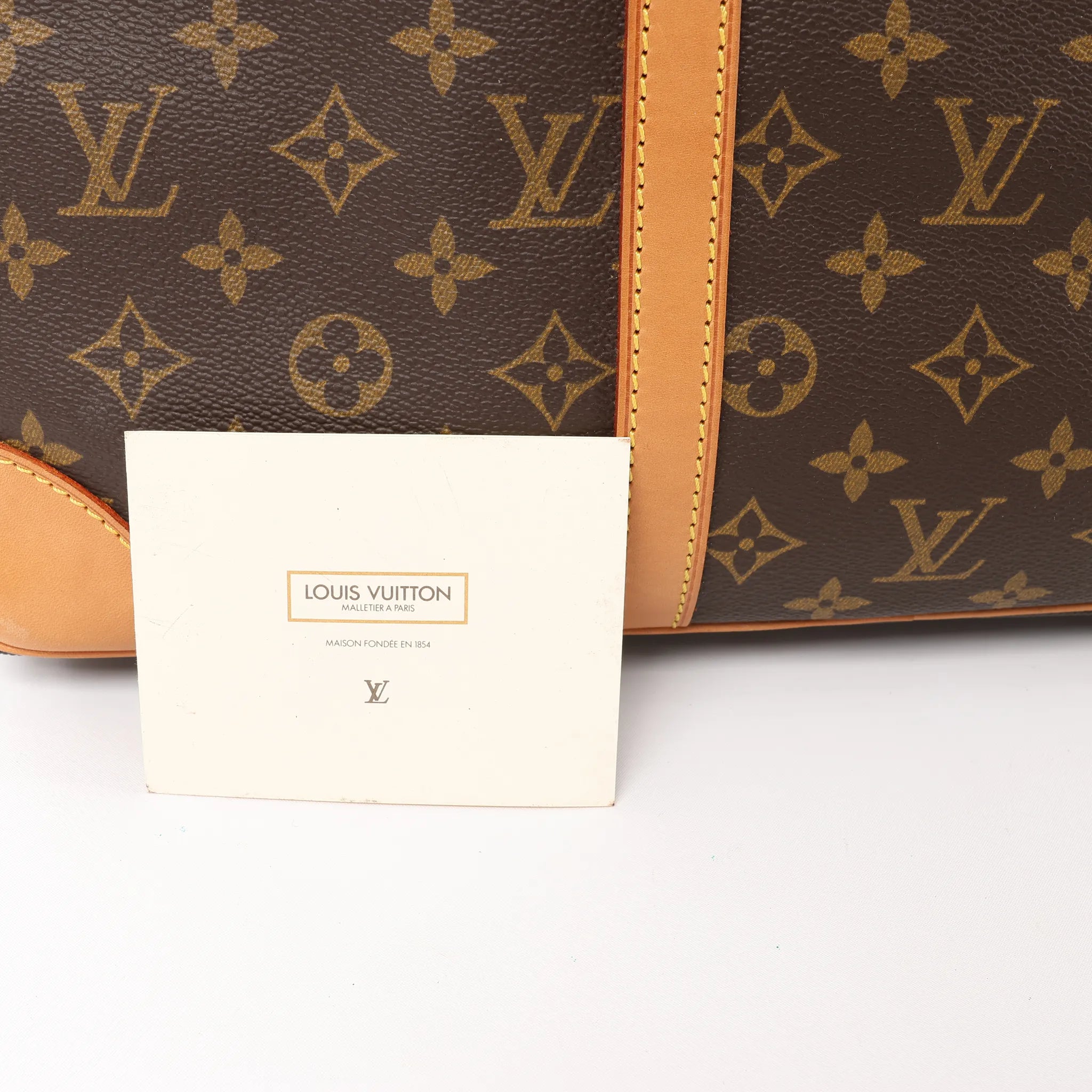 Louis Vuitton Porte Documents Voyage Monogram Canvas Handbag in Brown M53361