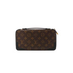 Louis Vuitton Monogram Macassar Daily Organizer wallet in brown canvas with black leather corner trim, zip-around closure, and small top handle