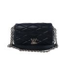 Black Louis Vuitton GO-14 MM leather crossbody bag with geometric quilting, silver-tone LV clasp and chain-and-leather shoulder strap.