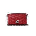 Red Louis Vuitton GO-14 Mini quilted leather shoulder bag with silver-tone LV twist clasp and chain strap.