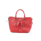 Red Louis Vuitton Mazarine PM Monogram Empreinte leather handbag with top handles, zip-top closure, and gold-tone hardware on a white background.