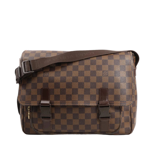 Louis Vuitton Melville crossbody bag N51125 in brown Damier Ebene Canvas with adjustable fabric strap, dual buckle flap closure, and front zip pocket.