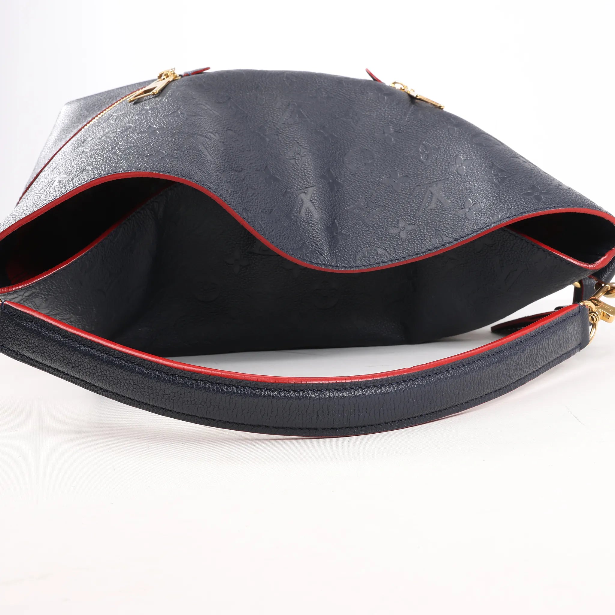 Louis Vuitton Monogram Empreinte Melie in Navy Blue M44012