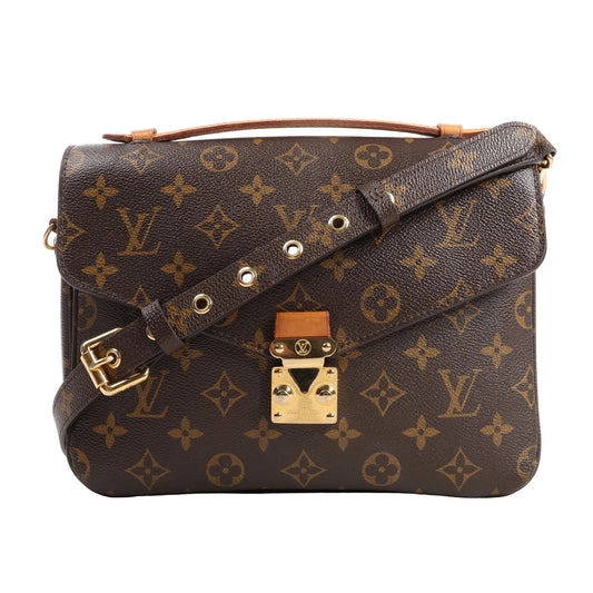 Louis Vuitton Pochette Métis MM crossbody bag in brown Monogram canvas with top handle, gold-tone S-lock, and adjustable leather strap.